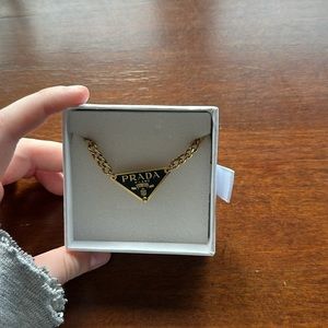 black and gold prada triangle necklace